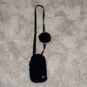 LULULEMON - black Sherpa crossbody bag.